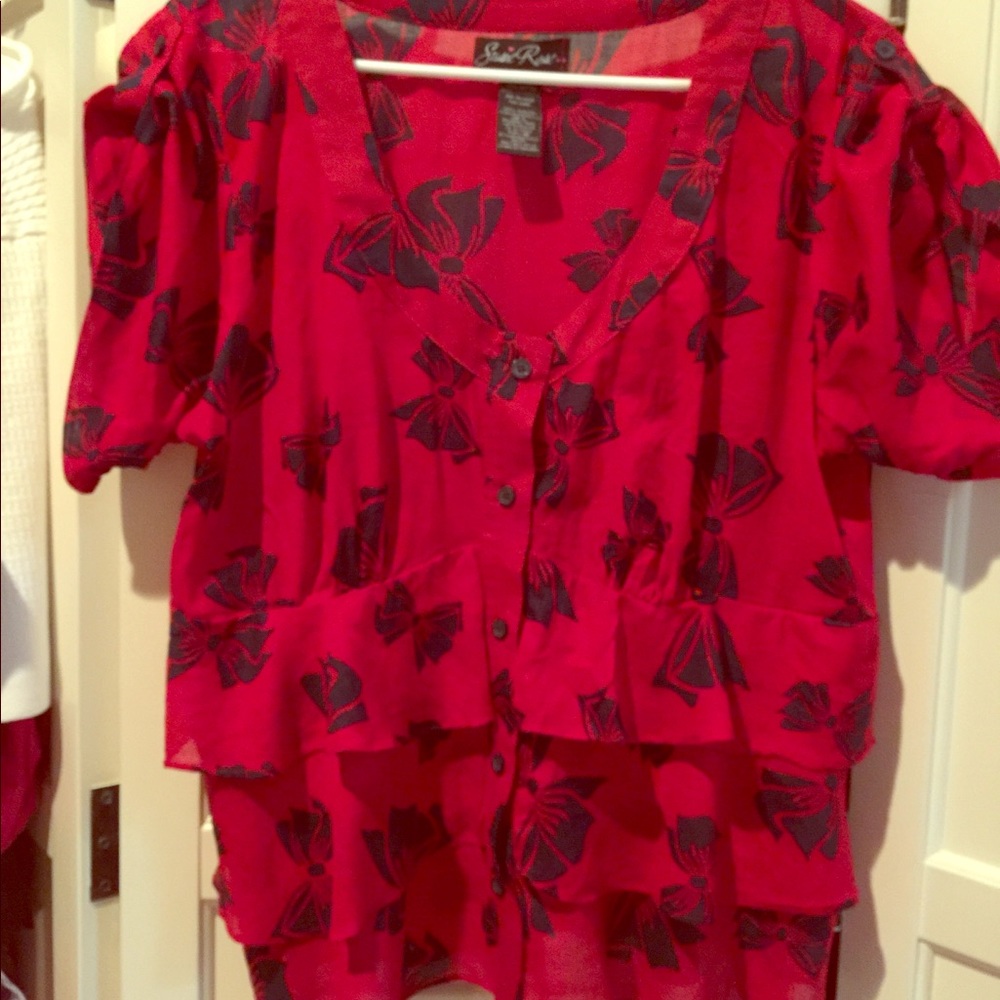 Lipstick red with navy bows and ruffles all around